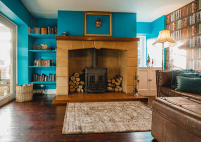 library book wall-look wallpaper professionally installed in den