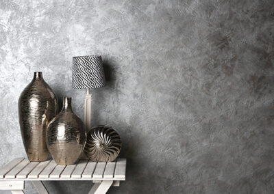 textural silver wallpaper installed in living room accent wall