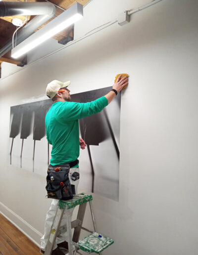 wallpaper hanger installing custom feature wall