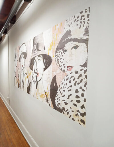 wallpaper installation on feature wall with custom illustrations