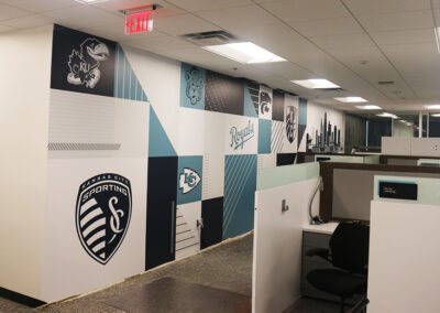Corporate sports-themed wallpaper wall after installation